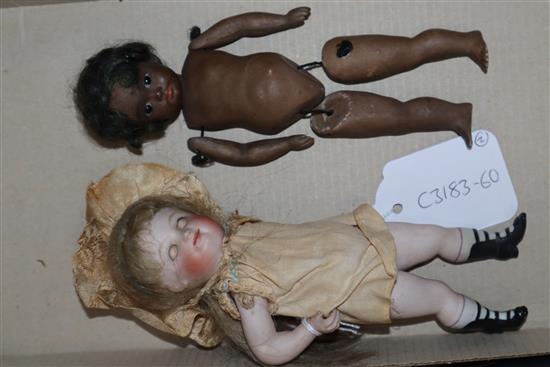 Two Victorian bisque dolls